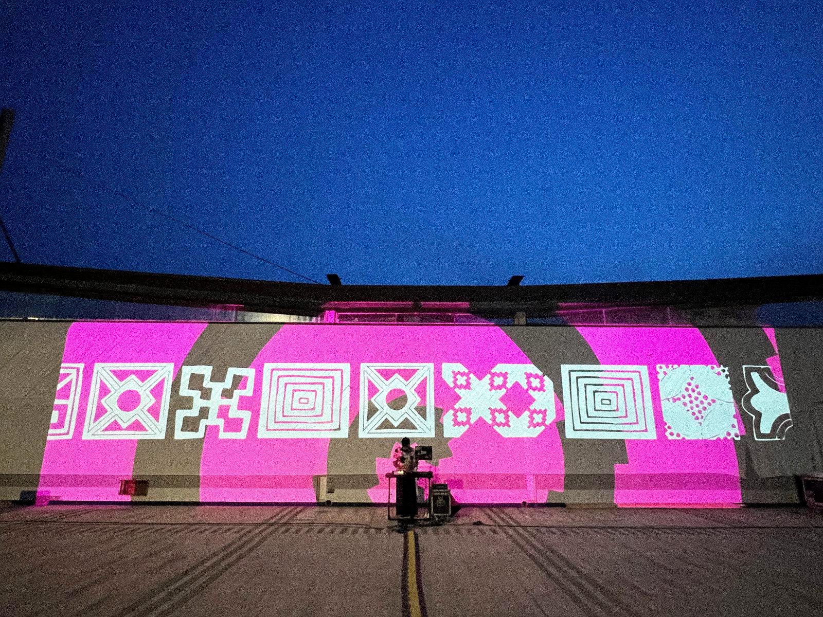 FANTASTIK - geometric patterns of ethnic origin projected at dusk